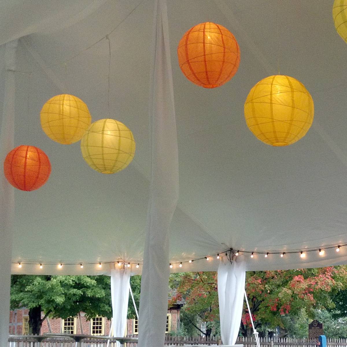 Lit Paper Lantern Installed in a Pole Tent